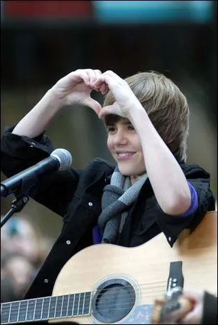 Quel style de chansons Justin interprte-t-il ?