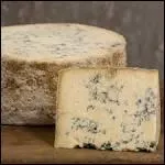 Quel est ce fromage de vache, de forme cylindrique, stri de nervures bleues qui convergent vers son centre, avec une pte riche et moelleuse de couleur blanc cass ?