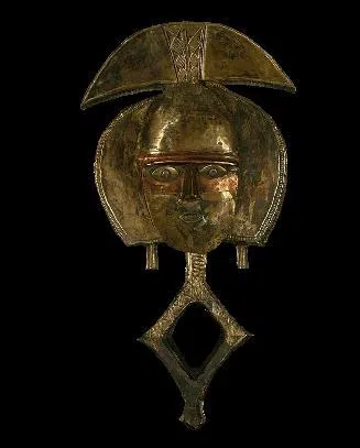 Cette sculpture de bois entirement recouverte de plaques de laiton et de cuivre est appele 'ngulu' par :