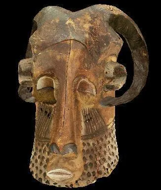 Ce masque du 19me sicle reprsentant un visage humain coiff d'une paire de cornes nous vient de la culture :