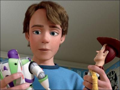 Qui est ce jeune garçon dont les 2 jouets préférés sont Woody le cow-boy et Buzz l'éclair ?