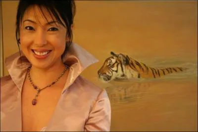 Elle mne un combat pour sauver les tigres de Chine en leur rapprenant la vie en libert.