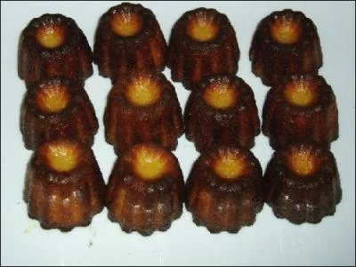 Quel est ce petit gteau, spcialit du Bordelais,  pte molle et tendre, parfume au rhum et  la vanille, et recouverte d'une paisse crote caramlise ?