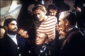 Dans ''20 000 lieues sous les mers'' (1954) de Richard Fleischer, le Nautilus est attaqu par :