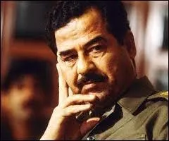 Sur quelle partie de la population de l'Irak, Saddam Hussein a-t-il pratiqué un génocide ?