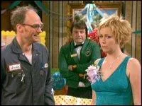 Qui est l'homme aux côtés de Carey ?