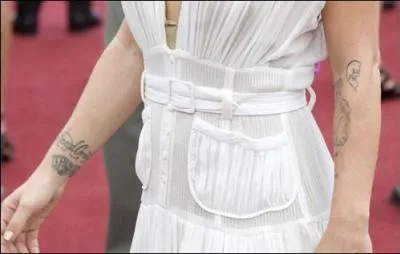  qui appartient ce tatoo ?