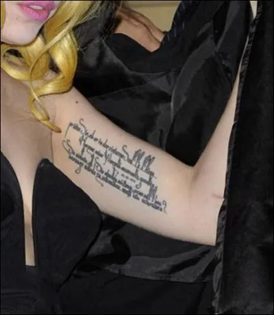  qui appartient ce tatoo ?