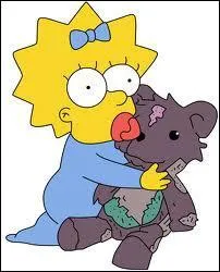 � qui appartient le nounours qu'a Maggie et comment s'appelle-t-il ?