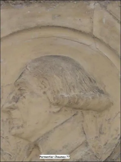 Ce médaillon sur une façade de maison représente ;