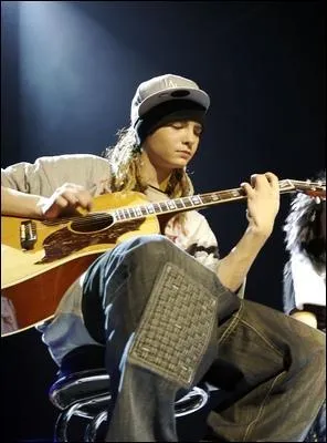 Quels sont les traits de caractres de Tom ?