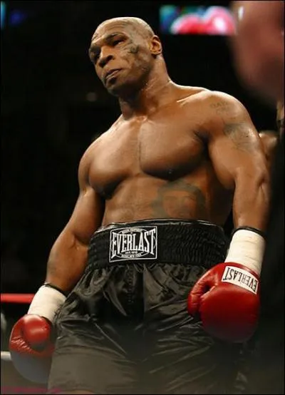 Qui est ce champion amricain de boxe ayant combattu dans la catgorie poids lourds ?