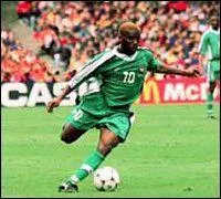 Capitaine du Cameroun  la CAN 2000,  Rigo  ralise un grand tournoi. En finale, face au Nigeria, il inscrit le tir au but dcisif. Le Cameroun s'impose, malgr le but splendide de ce nigrian...