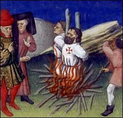 Pour quelle raison 'officielle' le roi fait-il emprisonner, torturer et brler les Templiers ?
