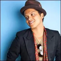 Dans 'The lazy song' de Bruno Mars, quelle tte ont ses danseurs ?