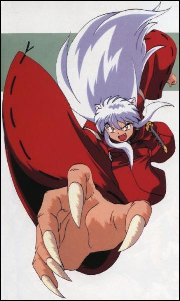 Une chevelure blanche surmonte d'oreilles de chats et des mains affubles de griffes acres...