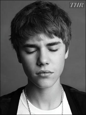 Avec quel artiste Justin n'a-t-il pas collaboré pour une chanson ?