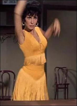 Dans quelle comdie musicale, dans laquelle elle a comme partenaire Dick Van Dyke, Janet Leigh entame-t-elle une danse du ventre dans cette jolie robe frange ?