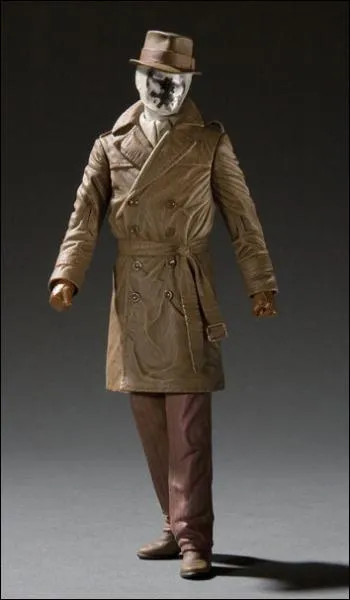 Dans quel film l'un des hros, Rorschach, est-il recouvert d'un masque sur lequel les ombres bougent en permanence ?