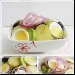 Comment appelle-t-on cette salade de pommes de terre tides aux oeufs durs, agrmente de rondelles d'oignon, de persil et de cpres ?