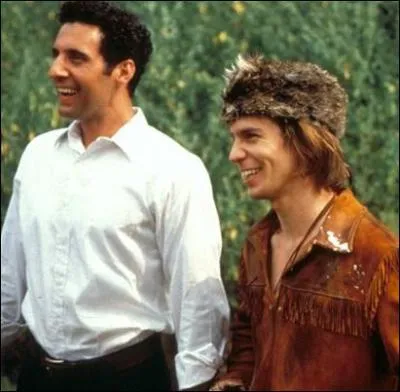 Dans quel film, dans lequel il incarne un jeune homme vtu comme Davy Crockett et surnomm 'The Kid', fait-il basculer la vie bien range d'un ingnieur incarn par John Turturro ?