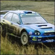 Qui remporte le titre en 2001 avec une Subaru Impreza WRC ?