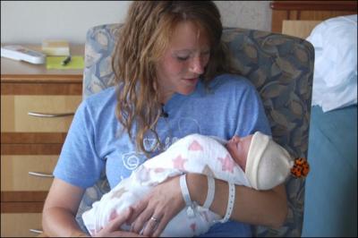Amber Miller, 27 ans, a parcouru le marathon de Chicago le 9 Octobre 2011, alors qu'elle tait enceinte de :