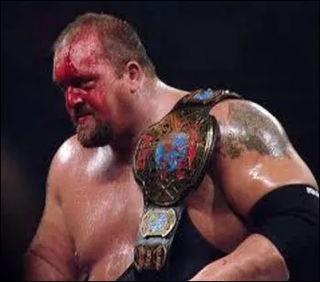 Le 04 juillet, le Big Show remporte le titre dans un :