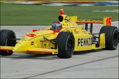 Avec quelle curie dbuta-t-il en Indy Car en 2002 ?