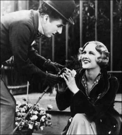 'Les Lumires de la ville', film ralis par Charlie Chaplin, est un film :