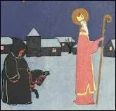 Que distribue le père Fouettard qui accompagne Saint-Nicolas ?