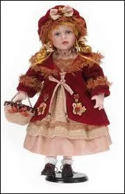 Cette poupe trs joliment habille est ce qu'on appelle...