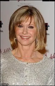 En quelle anne a-t-elle vaincu un cancer du sein ?