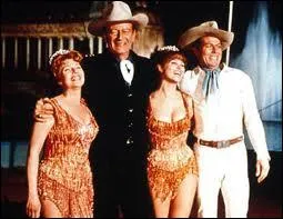 Quel est le titre du film o� elle joue avec John Wayne en 1964 ?