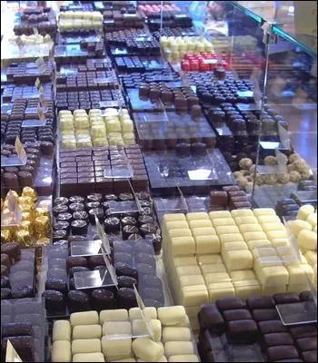Chocolatier renomm  travers le monde, proposant plus de 100 sortes diffrentes de chocolats belges dans 1400 points de vente  travers le monde :