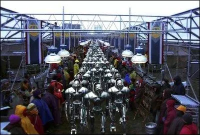 Sur New Caprica (dans la saison 3), qui collaborent avec les cylons ?