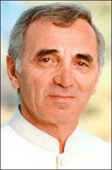 Dans laquelle de ses chansons entend-on Charles Aznavour dire : 'Nous changerons nos habitudes et ces mots que je croyais ntres, tu les diras dans d'autres bras' ?