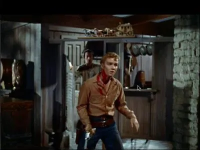 Souponne du vol, les habitants veulent pendre l'amoureuse de Johnny Guitar en compagnie d'un jeune bandit. Qui est ce dernier ?