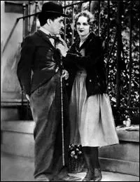 Un vagabond rencontre une jeune fleuriste aveugle.