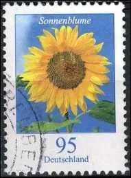 Quelle est cette fleur trs prise pour ses graines et son huile, visible sur ce timbre d'Allemagne ?