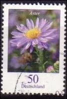 Quelle est cette fleur violette, visible sur ce timbre d'Allemagne ?