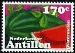 Quel est ce fruit constitu d'une bonne partie d'eau visible sur ce timbre des Antilles nerlandaises ?