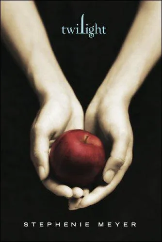 Que symbolise la pomme rouge sur la premire de couverture de  Fascination  ?