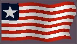 Si vous voyez un drapeau barré de 11 bandes horizontales blanc et rouge avec un rectangle bleu en haut à gauche décoré d'une étoile blanche, vous êtes sûrement à ---------.