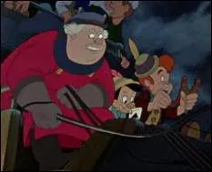 Comment s'appelle le mauvais garon rouquin que le cocher conduit avec Pinocchio au   pays merveilleux   des enfants ?