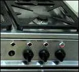 Avec quel appareil mesure-t-on la pression du gaz  l'entre d'une plaque de cuisson ?