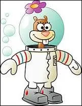 Avec qui Sandy adore-t-elle faire du karat ?