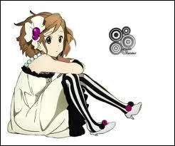 Qui est-ce ? Quel instrument joue-t-elle ?