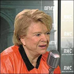 De quelle couleur sont les lunettes d'Eva Joly ?