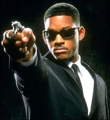 Qui doit se costumer en noir dans ce film de 1997 ?